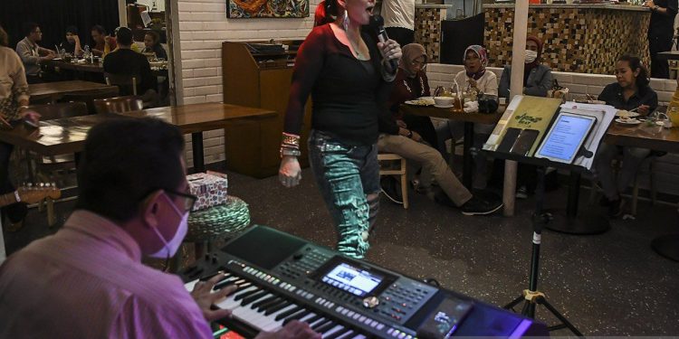Biaya royalti musik untuk kafe dan restoran serta metode pembayarannya